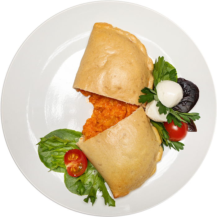 Image of the Buffalo Chicken Pocket product on a plate, with other assorted foods