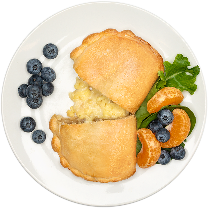 Image of the Sunrise 3oz Pocket product on a plate, with other assorted foods